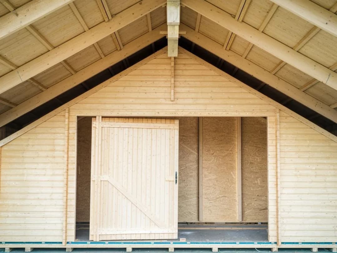 Jak zbudować konstrukcję garażu drewnianego w 5 krokach? Rady